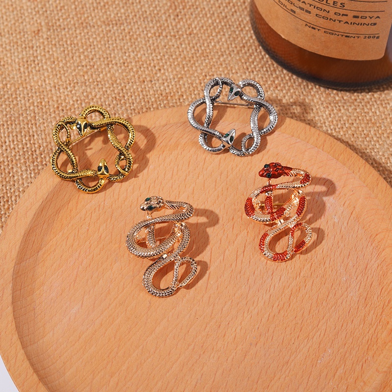 Cài áo hình rắn đính đá thời trang nữ