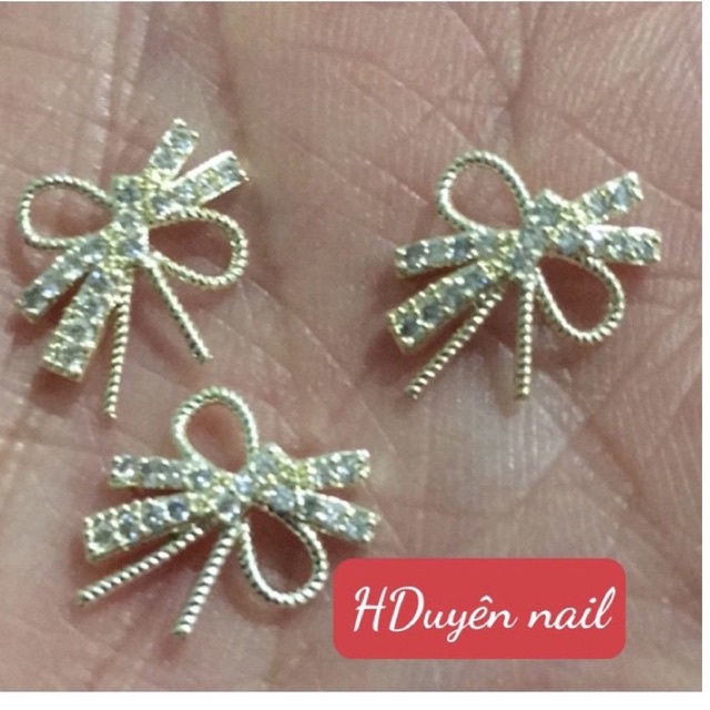 Cham nơ kim loại hàng 100% loại1 ( chăm mãi được hơn 1000 lượt mua họ xoá đánh soẹt thế là về số mo)