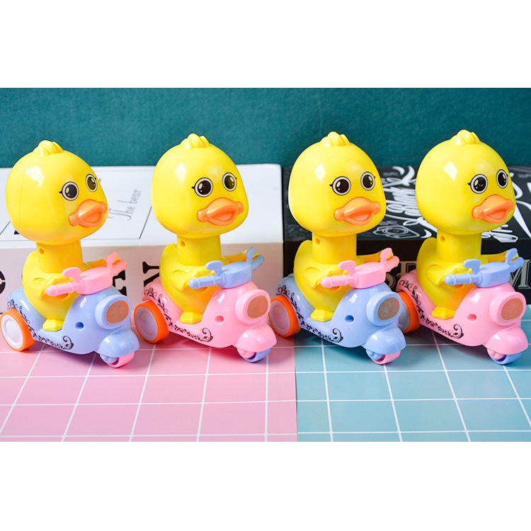 Đồ chơi dạng kéo họa tiết vịt con chạy xe moto dành cho trẻ em