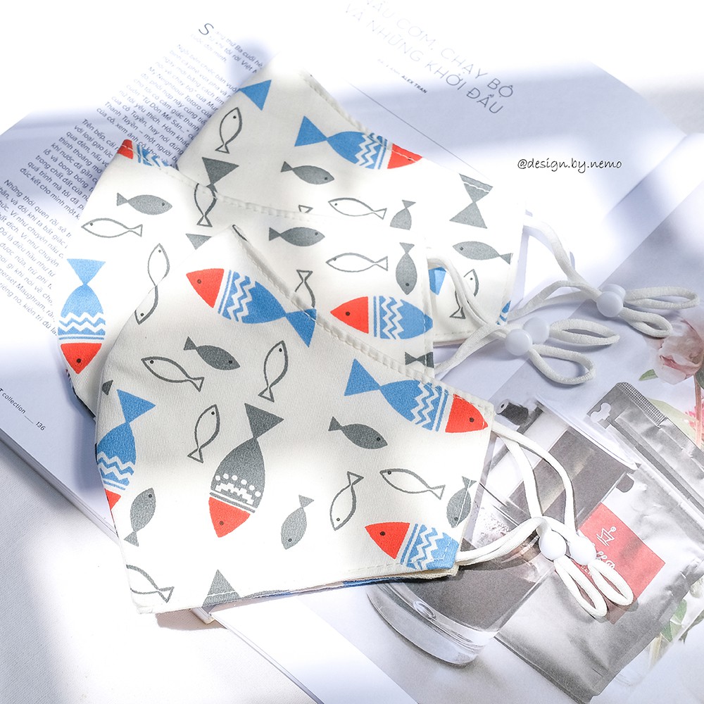 Khẩu Trang Vải Nemo Handmade Họa tiết Cá nền trắng nổi bật, có nút tăng giảm dây tiện lợi - KTCaNenTrang | BigBuy360 - bigbuy360.vn