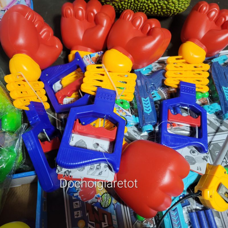 Đồ chơi tay đấm robot lò xo dùng cơ tay bóp
