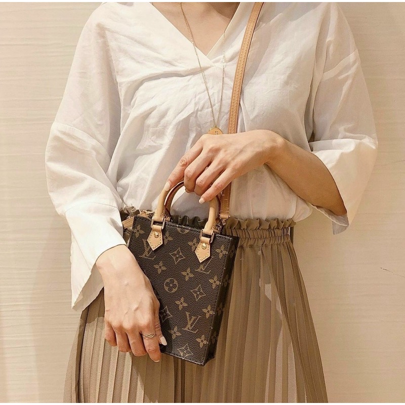 Túi LV mini và móc trâu