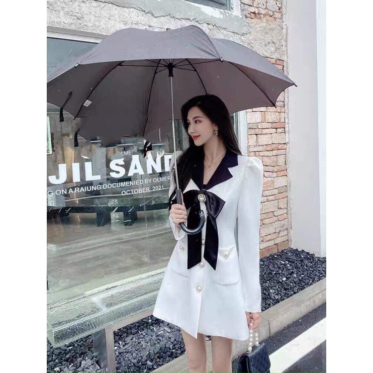 Đầm cổ vest dự tiệc hoạc đi chơi tay dài cỏ nơ ngực cài nút thật ,túi áo thật,chất liệu coton lạnh có 2 màu như hình