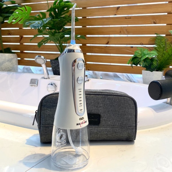 Máy tăm nước cầm tay Maxcare Max456S + Bàn chải điện sạch sâu Maxcare Hera Whitening SE