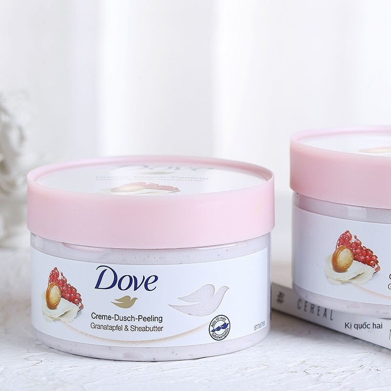 Kem Dove tẩy tế bào chết chiết xuất Macadamia / trái cây làm trắng và trẻ hóa 298g