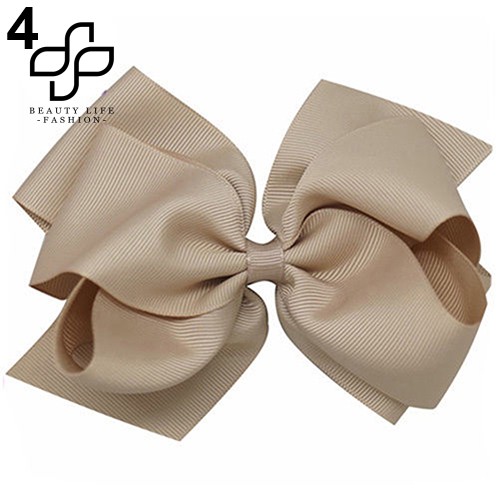 Kẹp tóc hình nơ xinh xắn