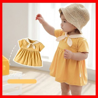 Váy vàng phối nơ cổ xinh cho bé gái