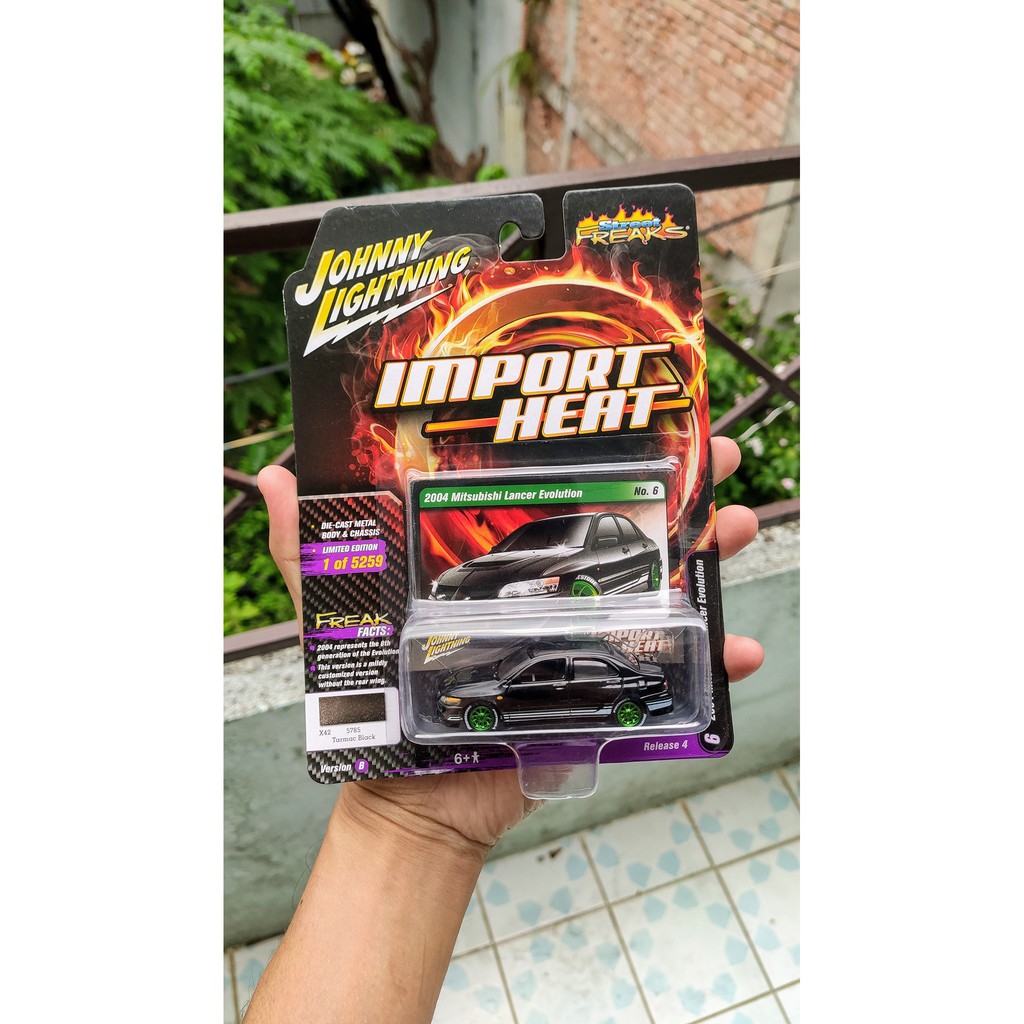 Mô hình tĩnh Johnny Lightning Mitsubishi Lancer Evolution tỷ lệ 1:64