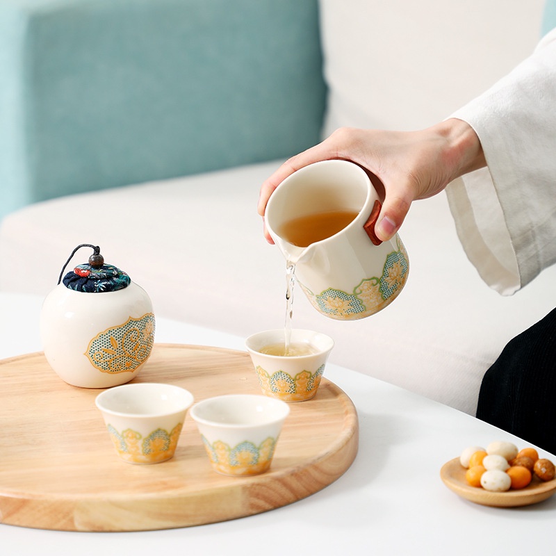 Bộ ấm chén pha trà bằng sứ (Có kèm túi du lịch chống va đập)