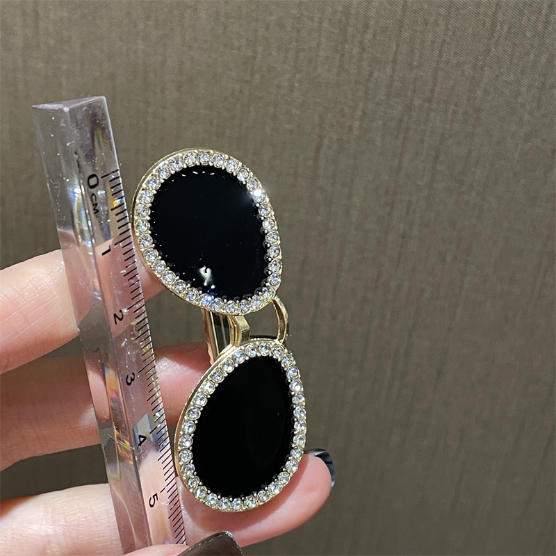 Kẹp tóc hình mắt kính