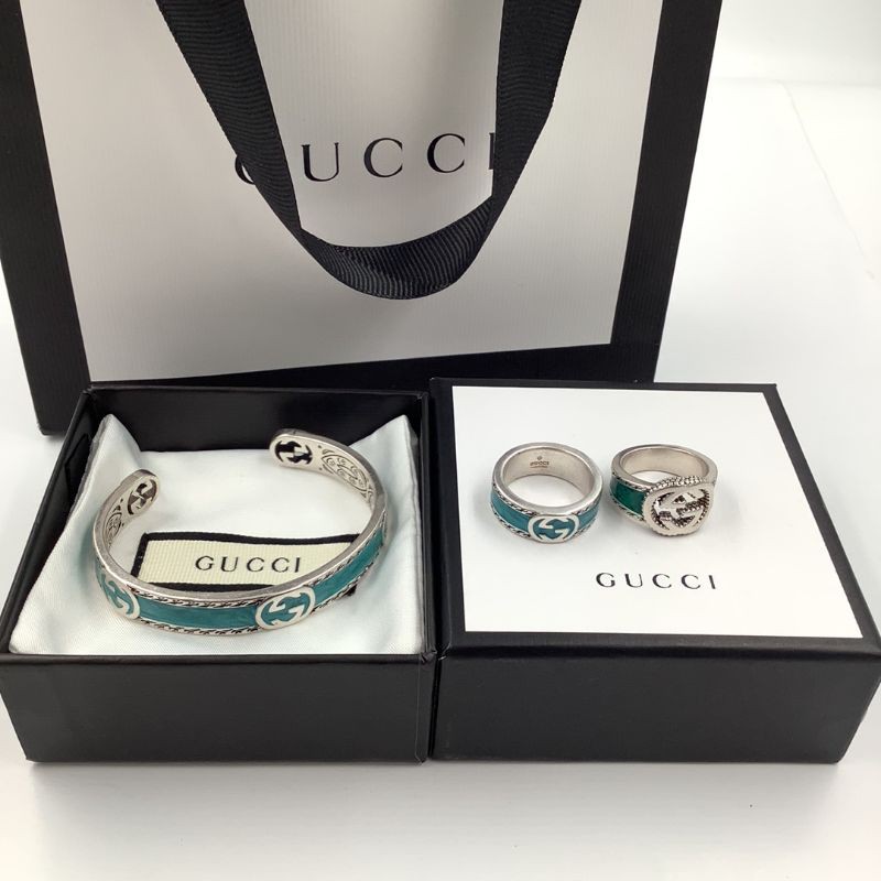 Vòng đeo tay và nhẫn Gucci bằng thép titan xi mạ bạc