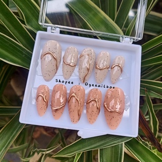 Móng tay giả sơn cát viền nổi