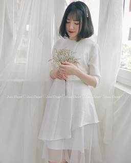 Váy trắng vạt lệch