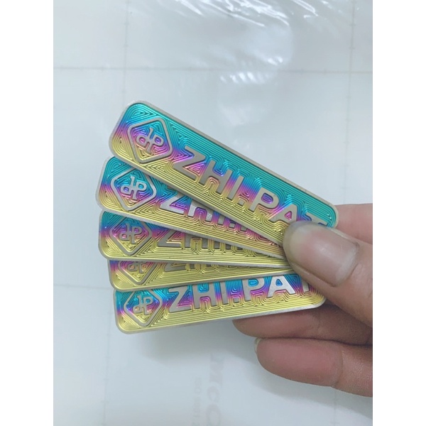 (Giá Đặc Biệt) LôGô Titan ZinPat Có Sẵn Keo 3M Gắn Nhiều Vị Trí Trên Xe