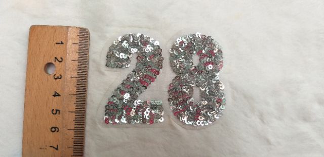 Hình ủi và hình may kim sa