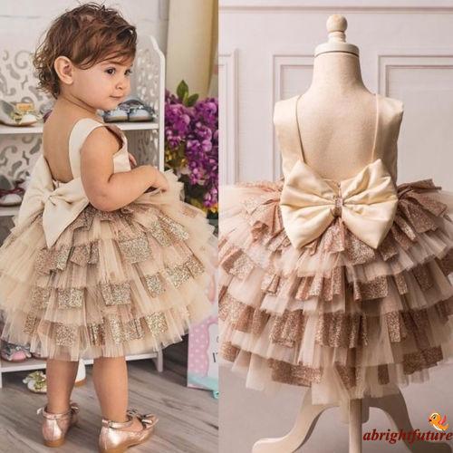 Đầm Tutu phối lưới đính nơ sau cho bé gái