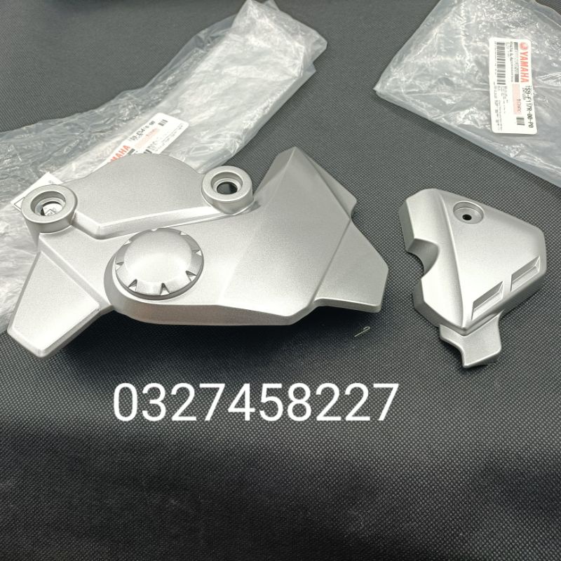 Cặp ốp nhựa che nhông mang cá, giò đạp xe EXCITER 2005-2010 bạc zin