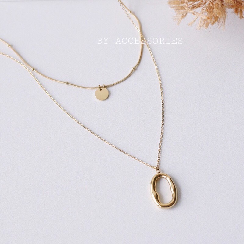 Dây chuyền titan 2 tầng mặt oval rỗng không gỉ