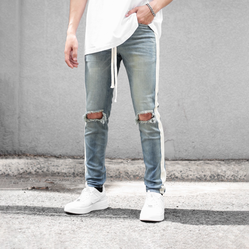 Quần Skinny Jeans Nam-Màu Xanh-Rách Gối-1 Sọc Trắng-Chất Liệu Cotton Co Giãn-Ống Đứng Dáng-Ống Ôm Chân Chuẩn Skinny