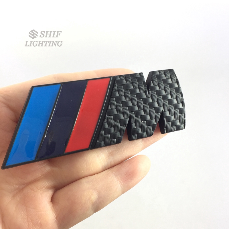 Miếng dán hình logo ///M bằng kim loại mặt sợi carbon dành cho xe hơi BMW