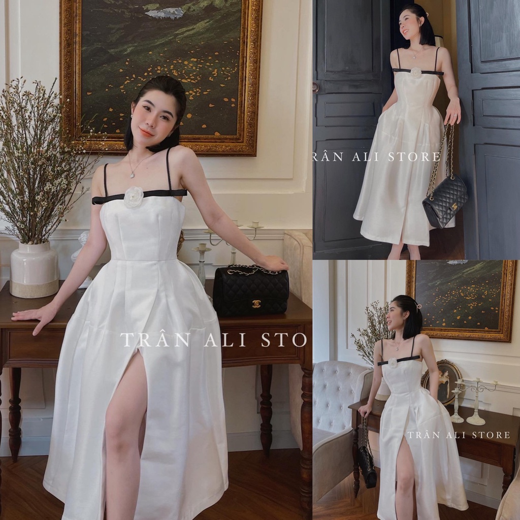 Đầm váy nữ dạ tiệc hai dây kết nơ xẻ tả màu trắng tinh khôi, sang chảnh.