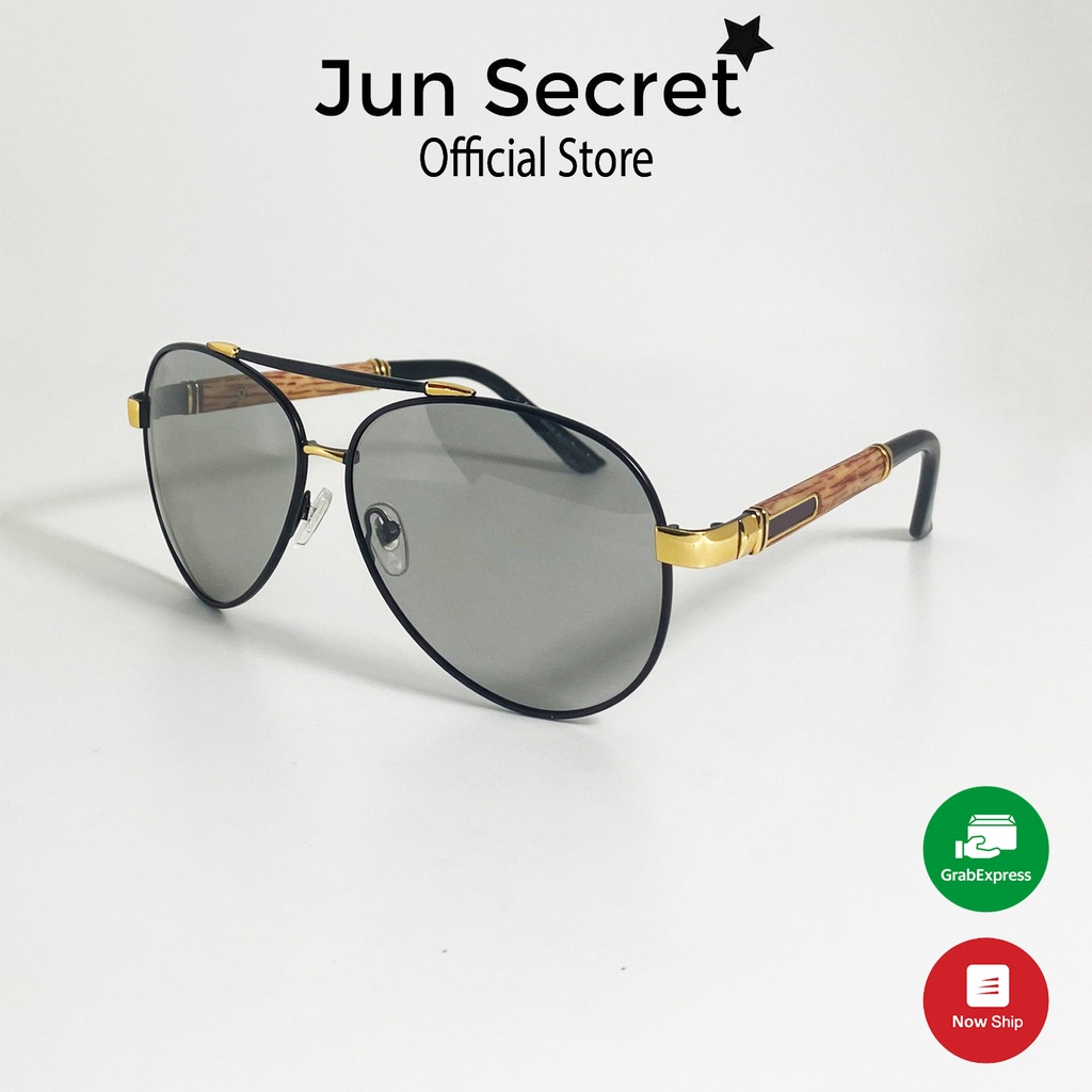 Kính mát nam cao cấp Jun Secret gọng gỗ,tròng kính đổi màu nhẹ khi ra nắng,có chống tia UV bảo vệ an toàn cho mắt JS8562