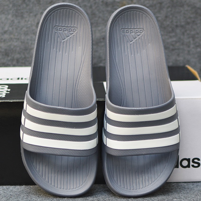 Adidas Duramo màu xám sọc trắng