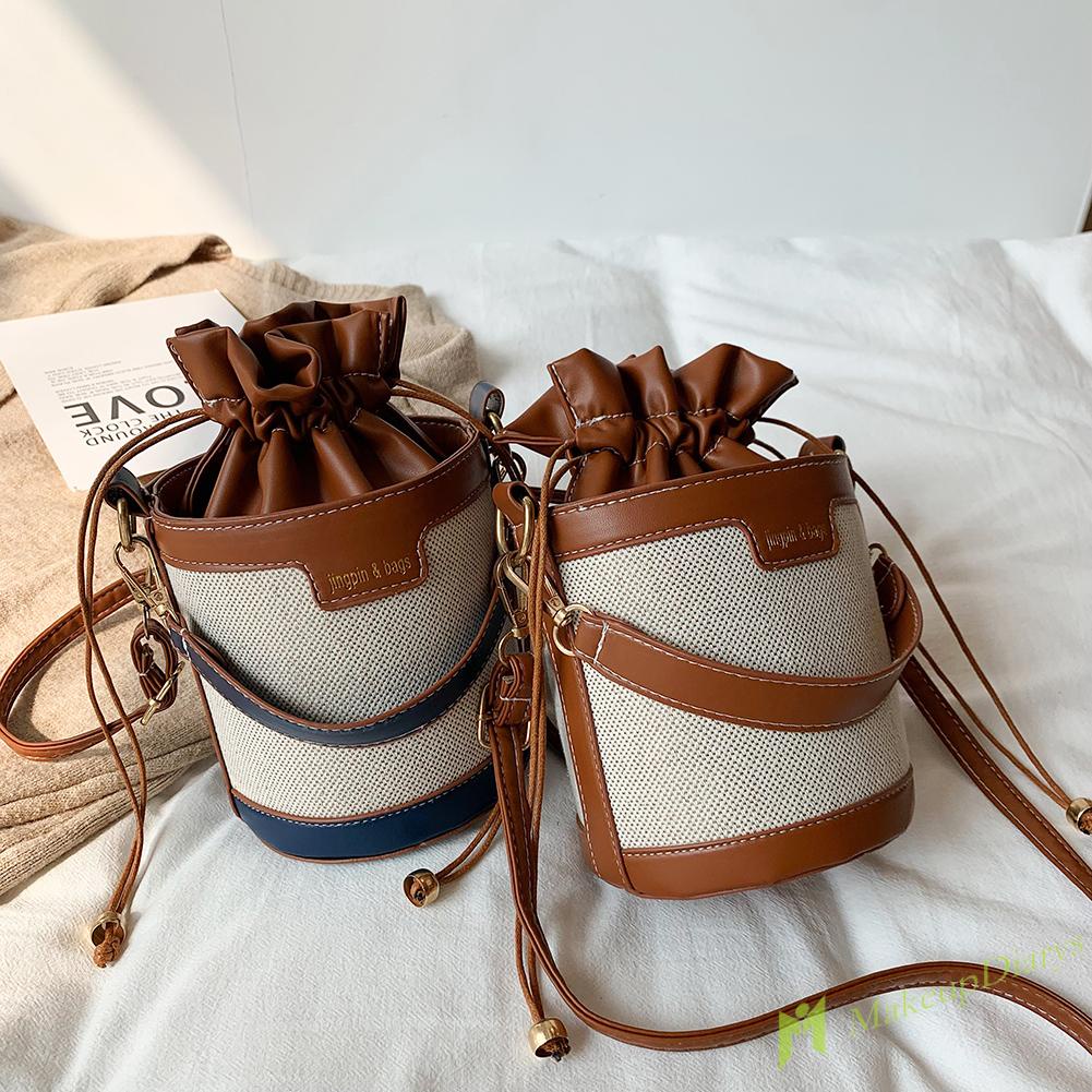 Túi xách da mini dây rút hình trụ cho nữ