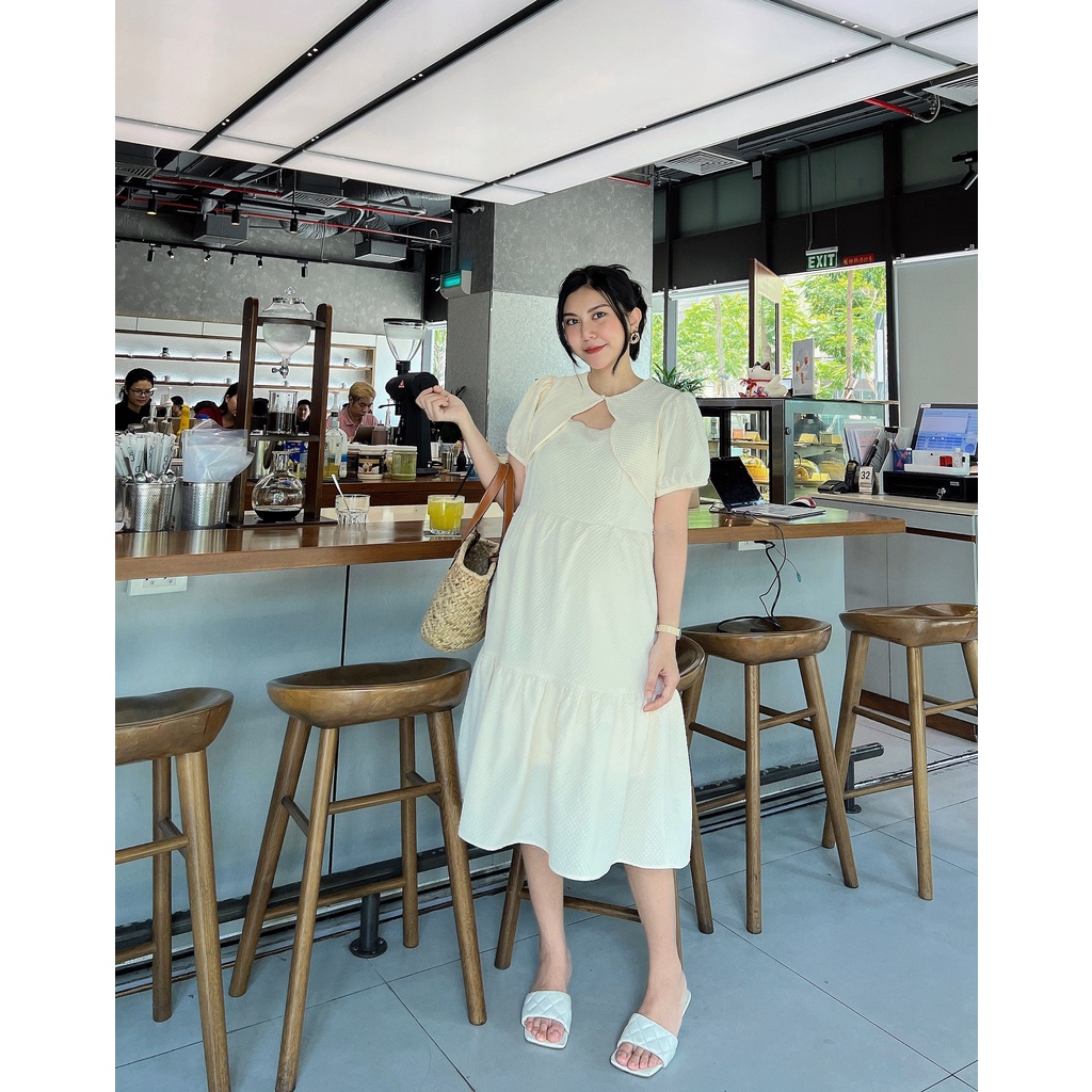 Đầm Bầu nhún tầng xếp ly trẻ trung.