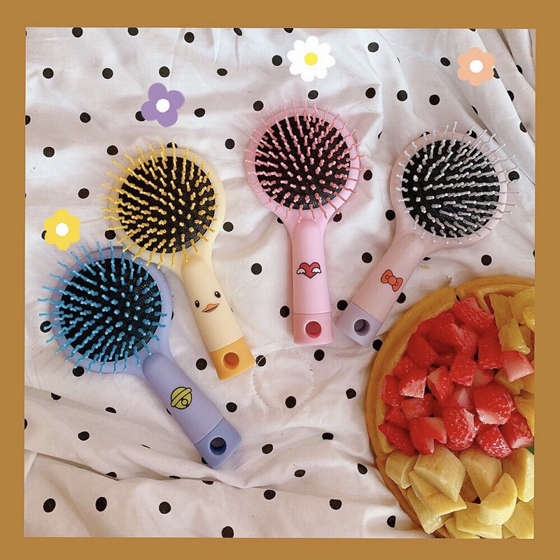 Lược mini có gương cầm tay