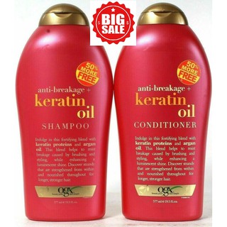 Một cặp dầu gội - dầu xả BIOTIN OGX Anti-Breakage Keratin Oil ( 577ml ) chống gãy rụng và chẻ ngọn tóc