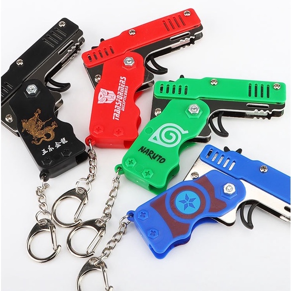 Súng Bắn Dây Thun Móc Chìa Khoá Dạng Đồ Chơi Gấp Gọn Tặng Kèm Dây Thun