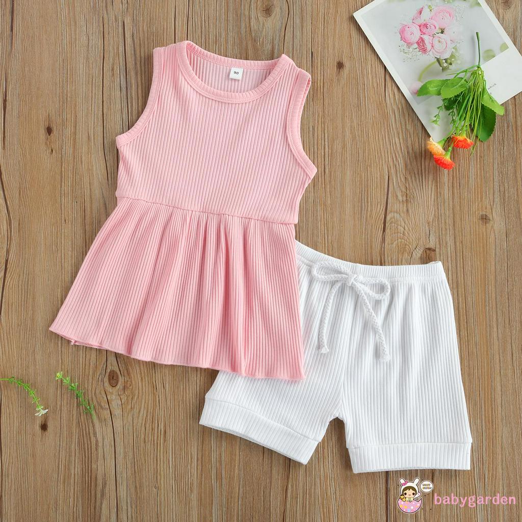 Bộ áo không tay cổ tròn và quần short bằng vải thun gân cho bé gái từ 2-7t