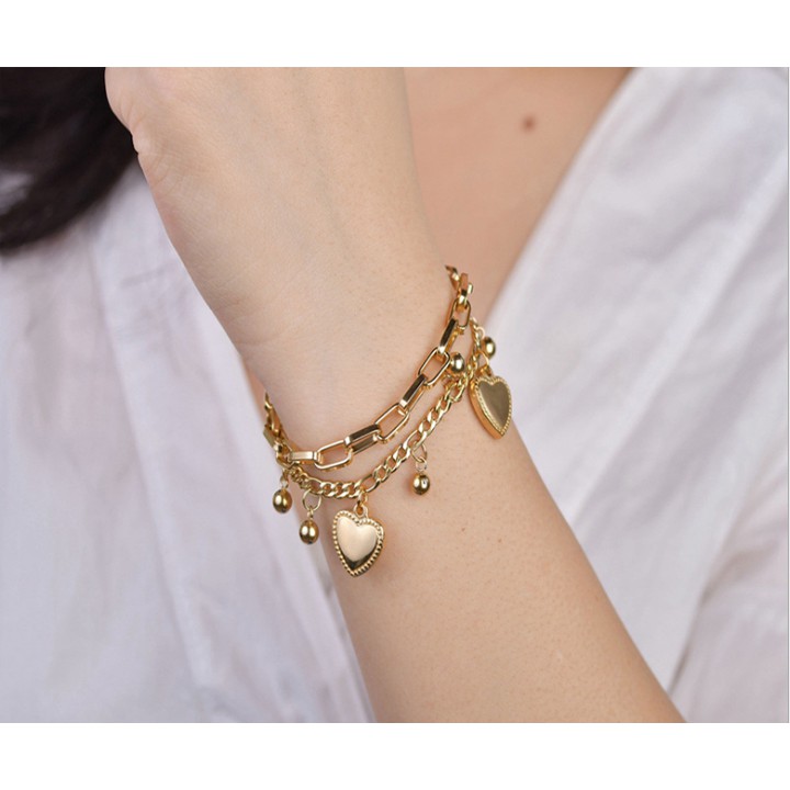 Lắc tay (vòng tay) titan vàng trái tim