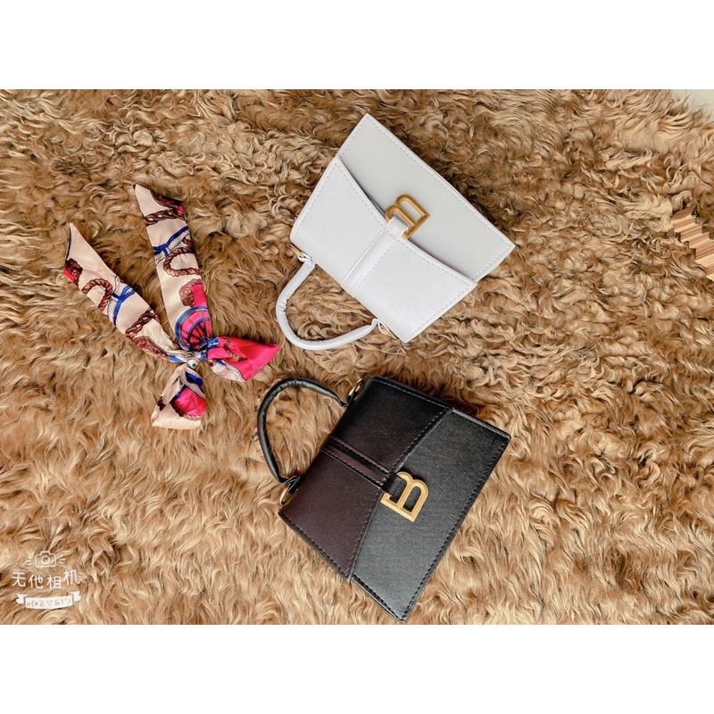 Túi khoá B cầm tay cực xinh