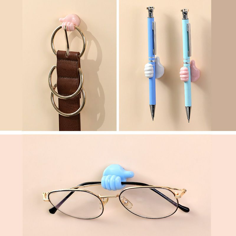 Móc dán tường treo đồ, kẹp giữ cáp sạc, tai nghe hình bàn tay. Cho 1 LIKE