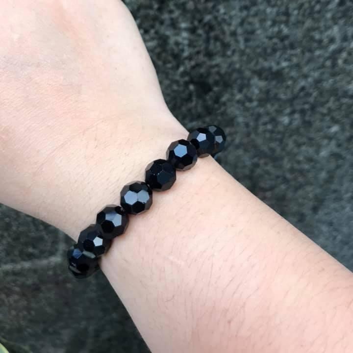 VÒNG TAY PHA LÊ ĐEN MÀI GIÁC HẠT 10LY
