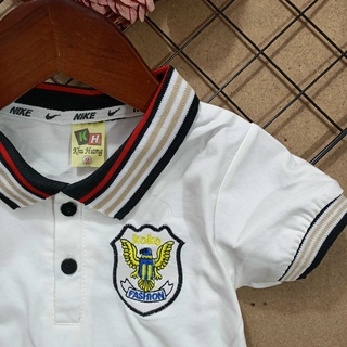 Áo trắng polo bé trai