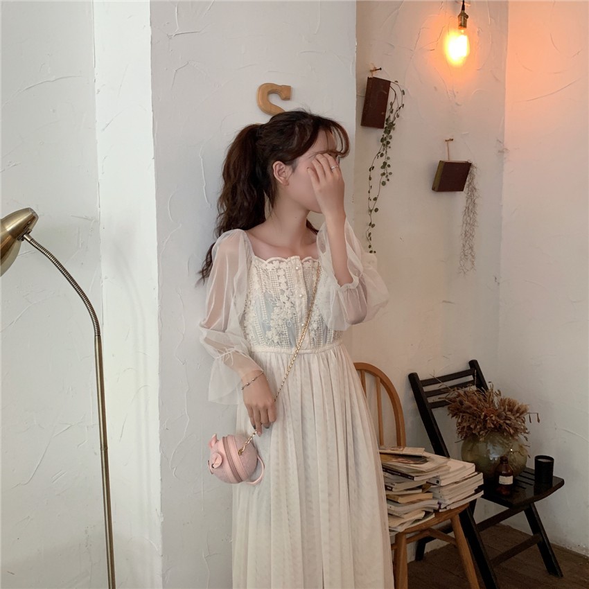 Đầm dự tiệc trễ vai dáng xòe trắng cổ vuông phối voan