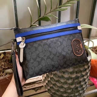 Clutch Coach cho nam kèm móc tay tiện cầm xinh