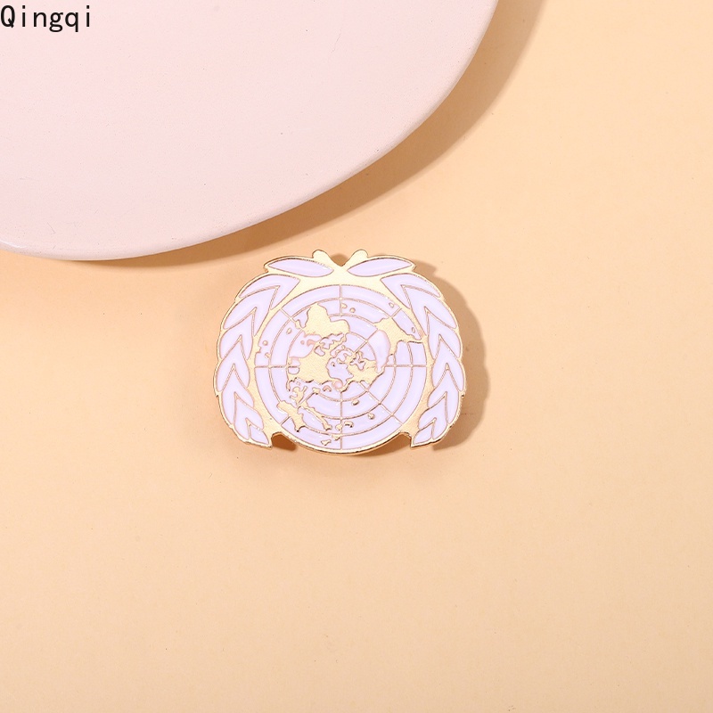 Ghim cài áo MISS ZOE phối hình trái đất và cành ô liu tráng men dễ thương