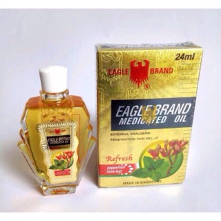 Dầu con ó Vàng Nụ Đinh Hương và lá bạc hà Singapore 24ml