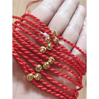 Vòng dây chỉ đỏ hột vàng