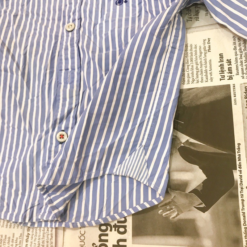 Áo sơmi si co bé nam.