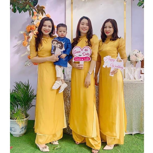 Áo Dài Cách Tân Nữ 4 Tà Lụa Tơ Sống Vàng Cổ Bèo Vai Bồng Đính Nơ Ngọc Đẹp CTV020