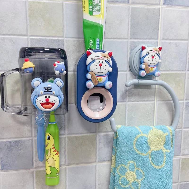 Dụng cụ lấy kem đánh răng tự động gắn tường không cần khoan họa tiết hoạt hình dễ thương cho bé