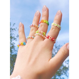 Nhẫn hạt nhiều màu xỏ hoa