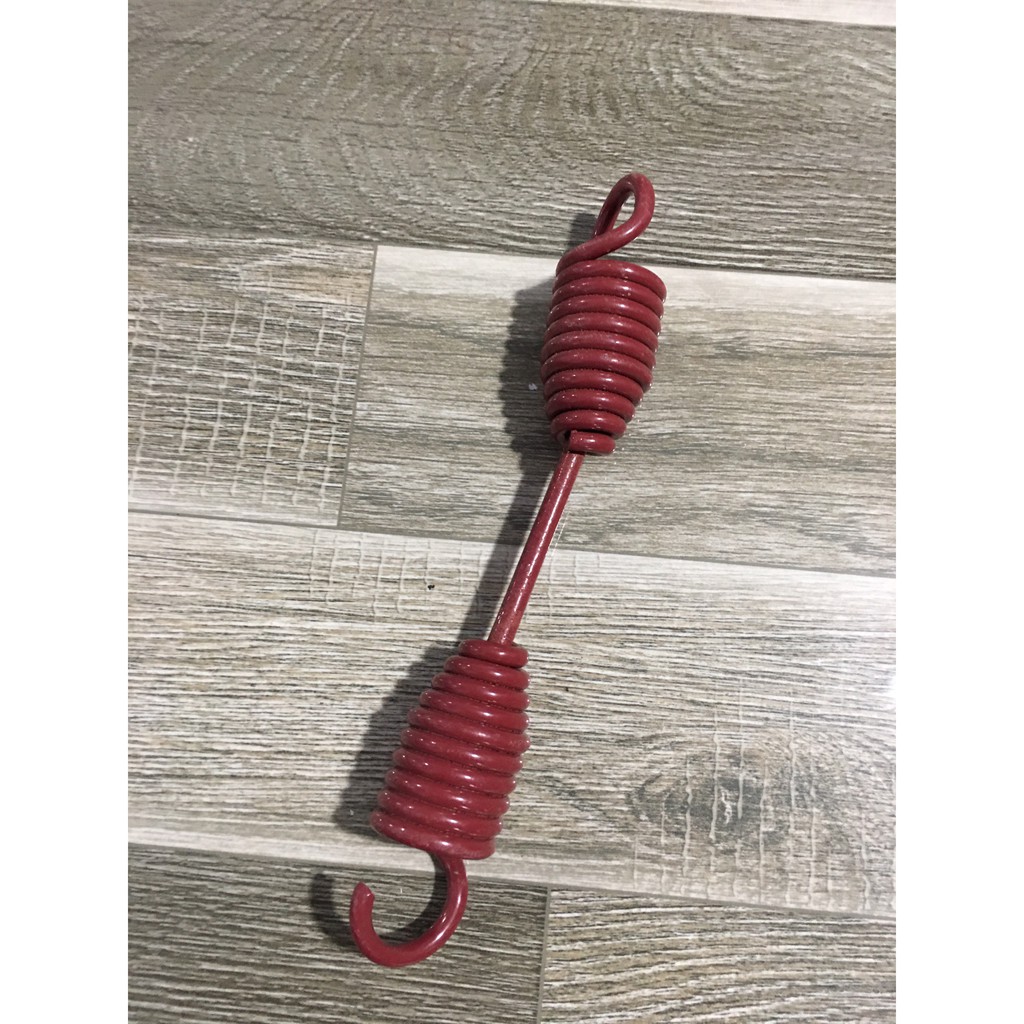 Lò xo kéo má phanh hổ vồ đôi đỏ lò xo kéo má phanh xe ô tô howo đầu kéo