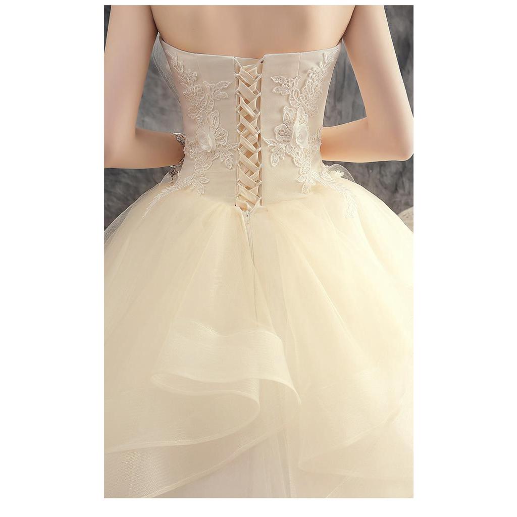 Váy cưới cô dâu phong cách mới rượu sâm banh khí chất bãi cỏ mộng mơ thời trang váy cưới bên bờ biển