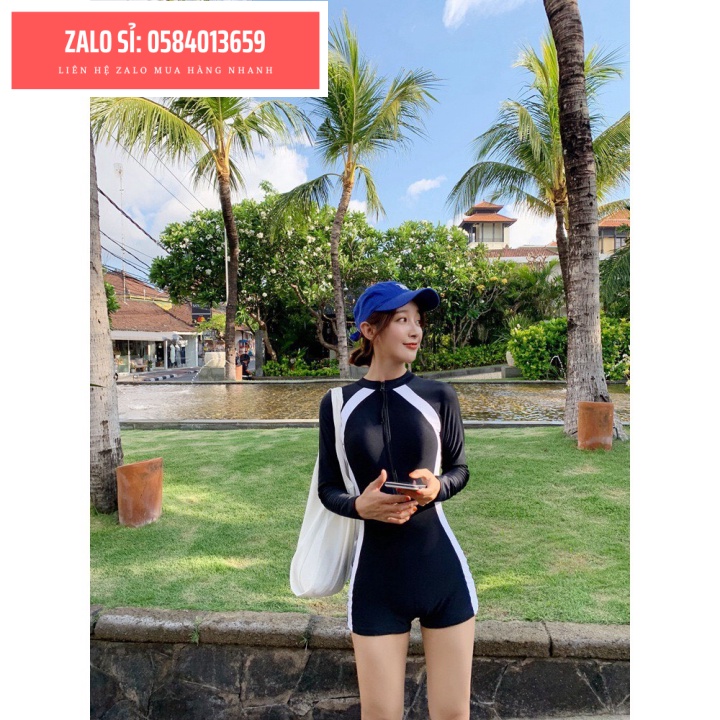 Bikini liền mảnh, bodysuit có tay khoá kéo màu đen chạy sọc trắng, quần form short kín đáo